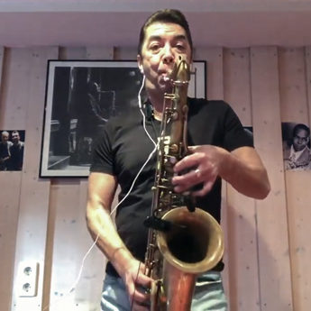 saxophonist playing melody from the coronavirus song side by side